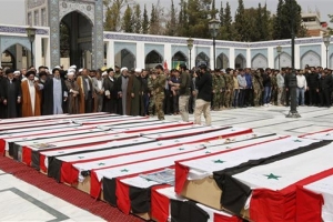 Syrians hold mass funeral for victims of Aleppo bombing