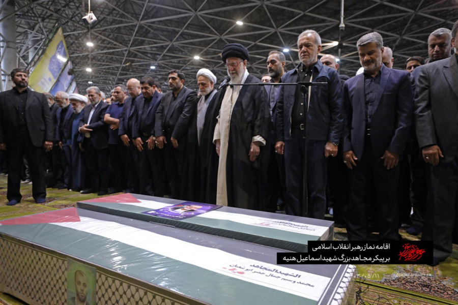 The Leader of the Islamic Revolution of Iran offering prayers on the body of the great mujahid of Martyr Ismail Haniyeh