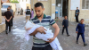 Scores killed in new Israeli strikes as starving Gazans wait for aid