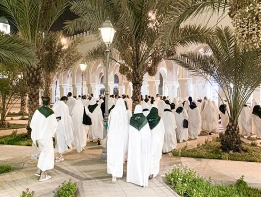 What should someone do if they pass the Miqat without ihram?